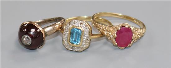 Two 9ct gold and gem set rings and a Victorian garnet and diamond ring.